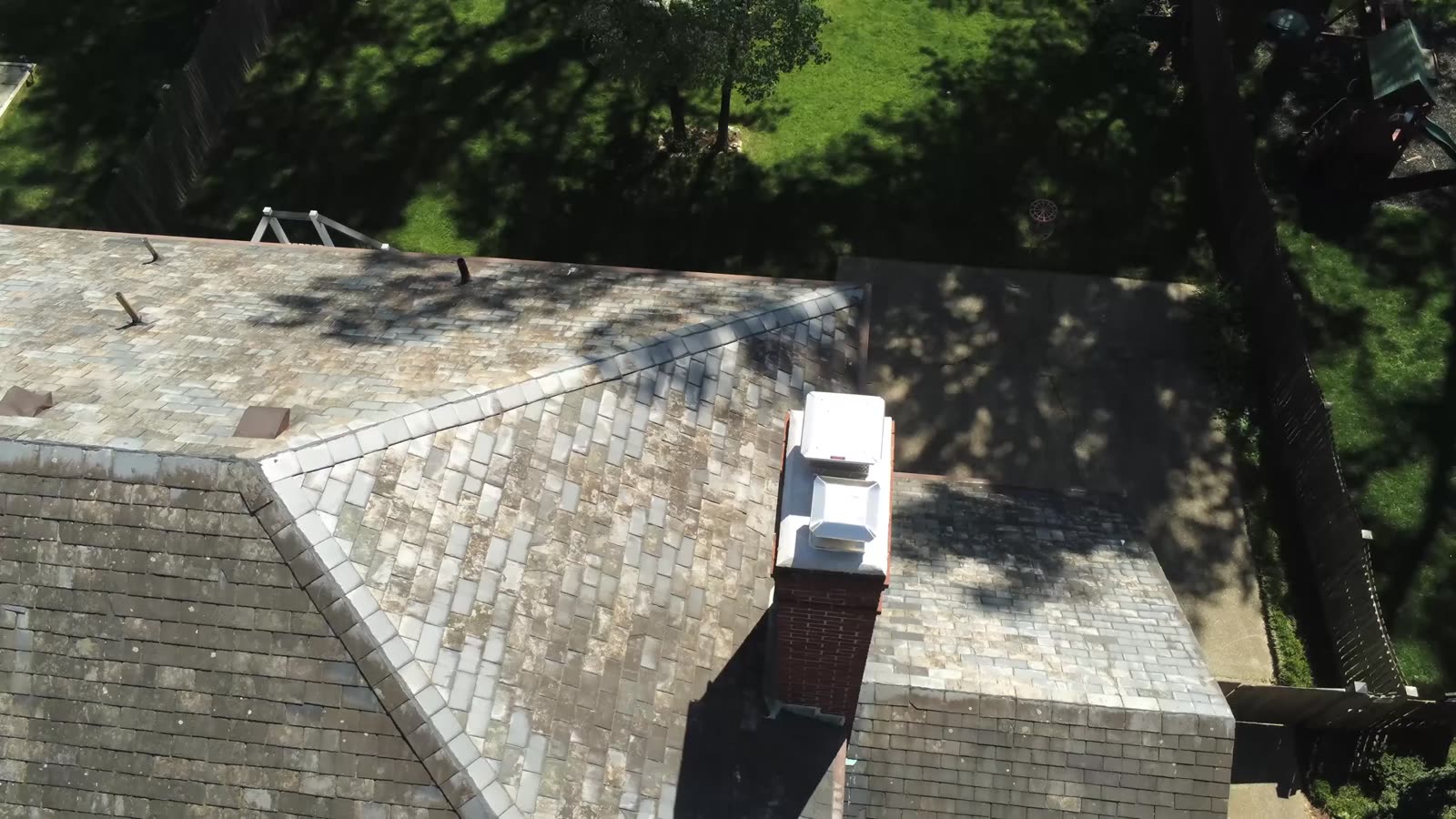 Apex Roofing and Construction crew on a residential roof